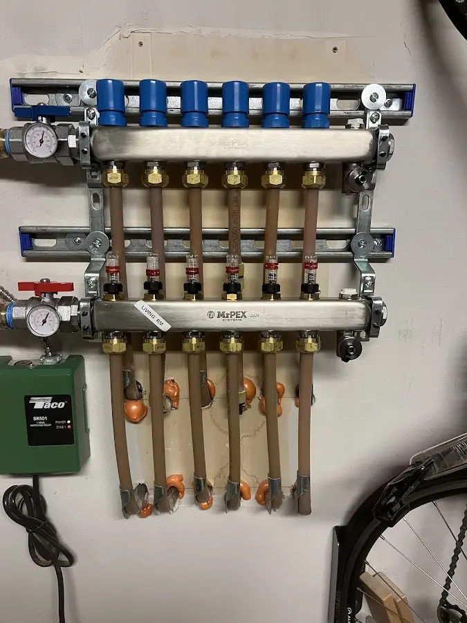 Plumber performing Gas Line Installation at a residential property in Lower